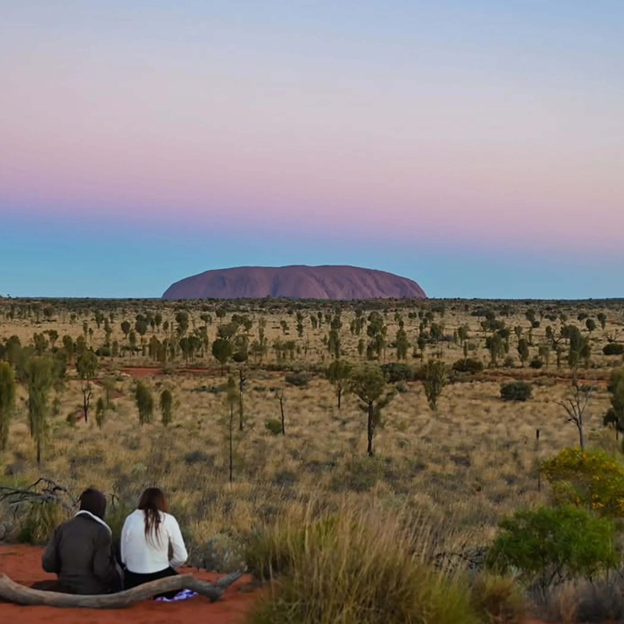 uluru rock formation and landscape