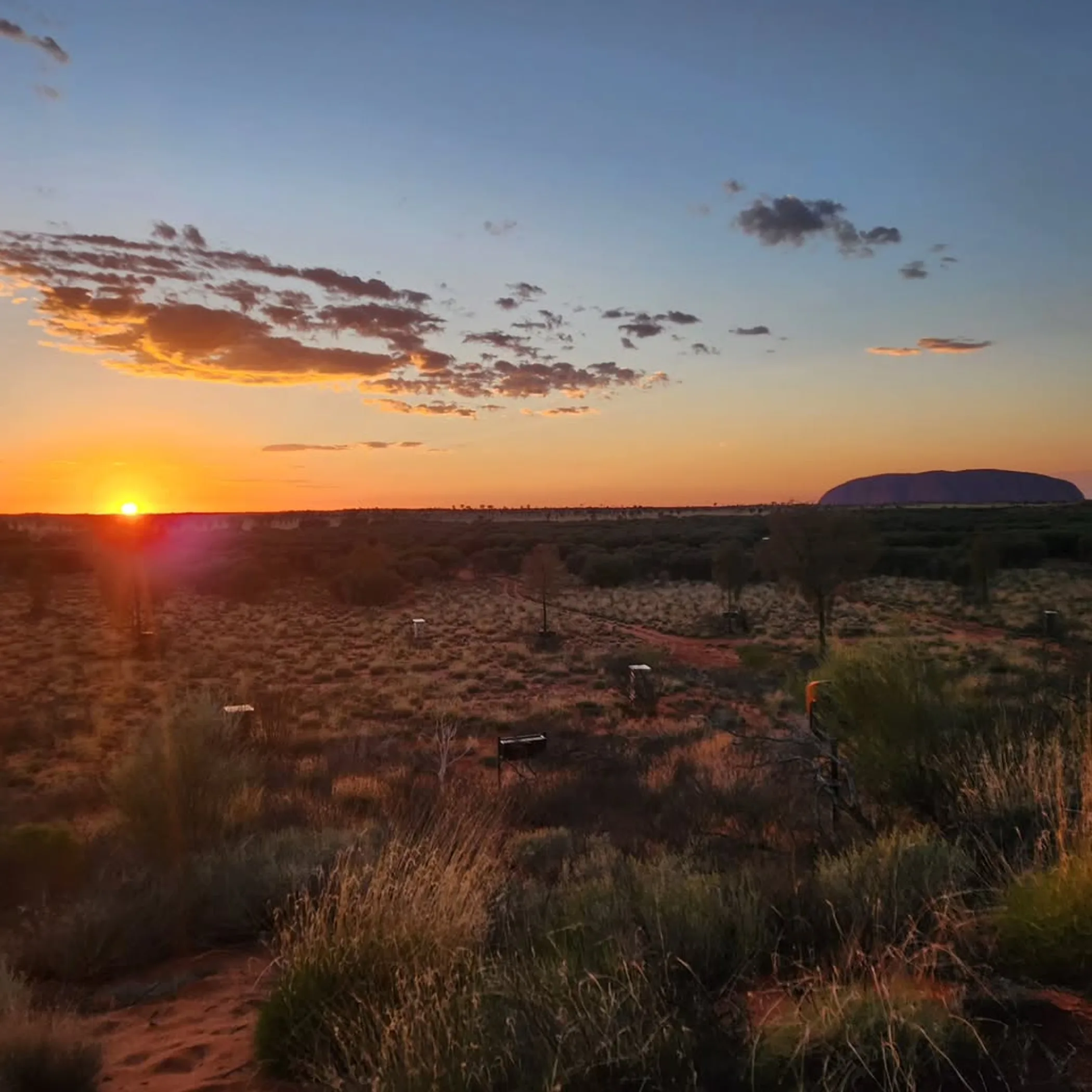 uluru rock formation at sunset