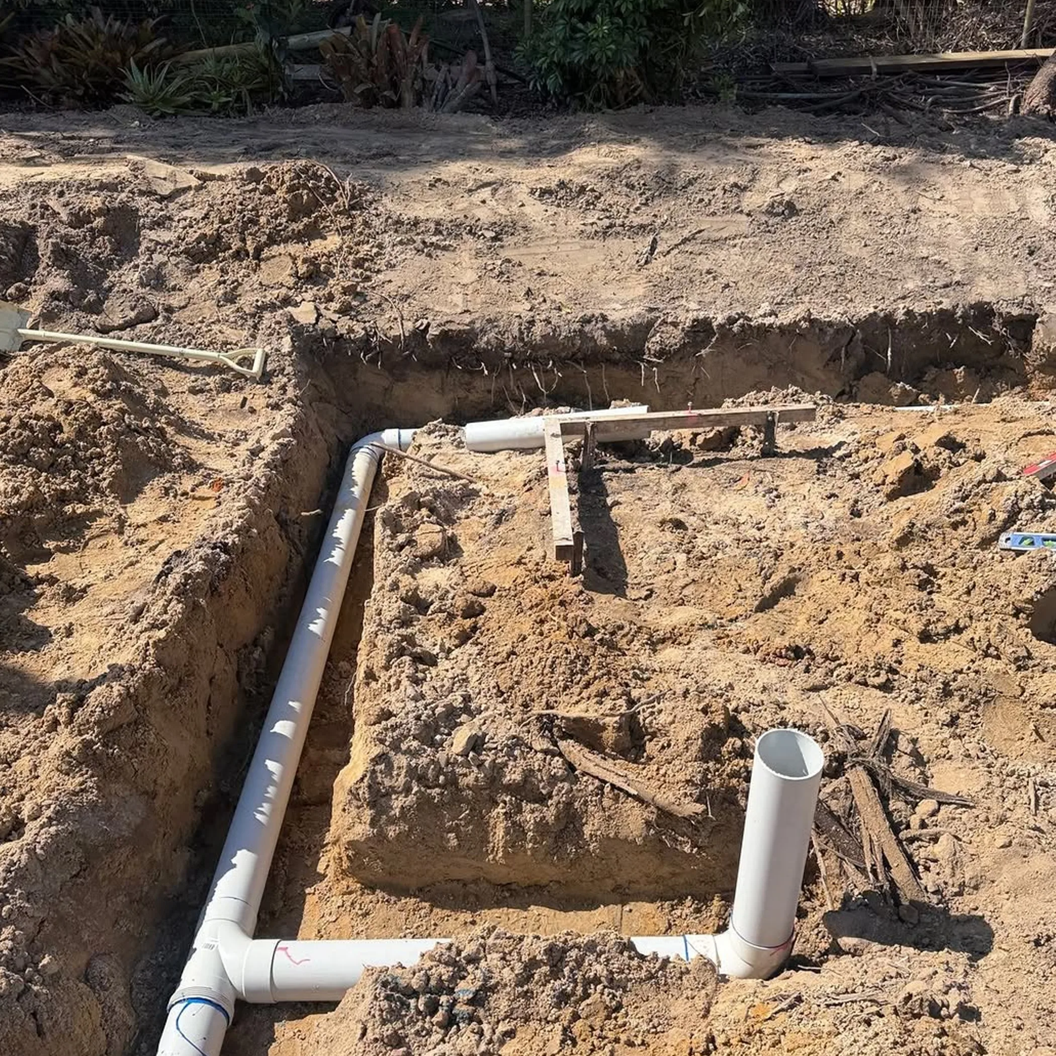 new plumbing installation with visible pipes